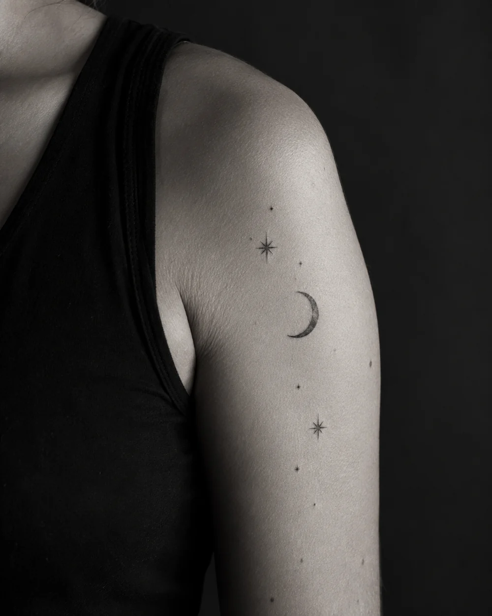 AI-generated tattoo concept: Small celestial details, endless possibilities